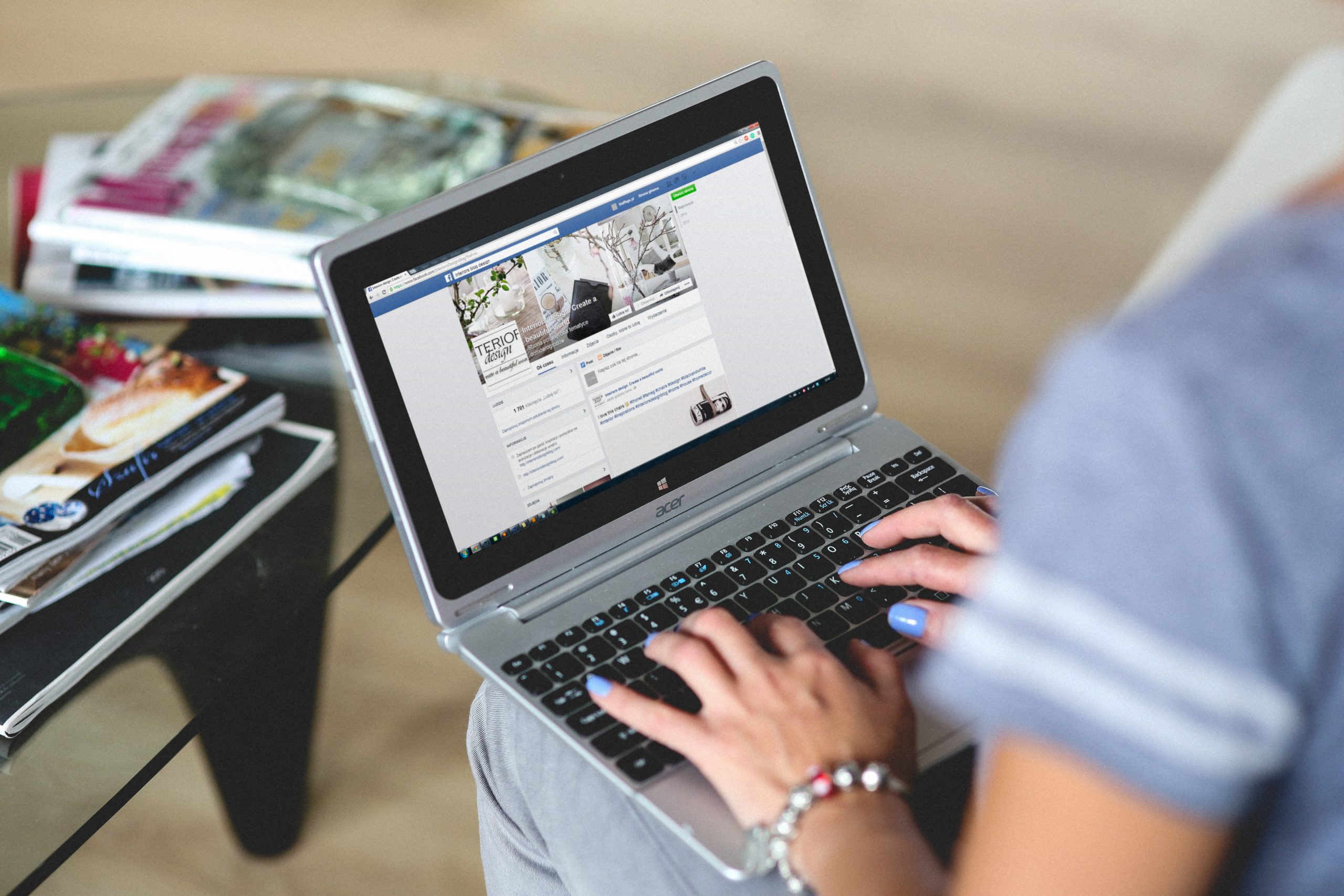 woman typing on laptop