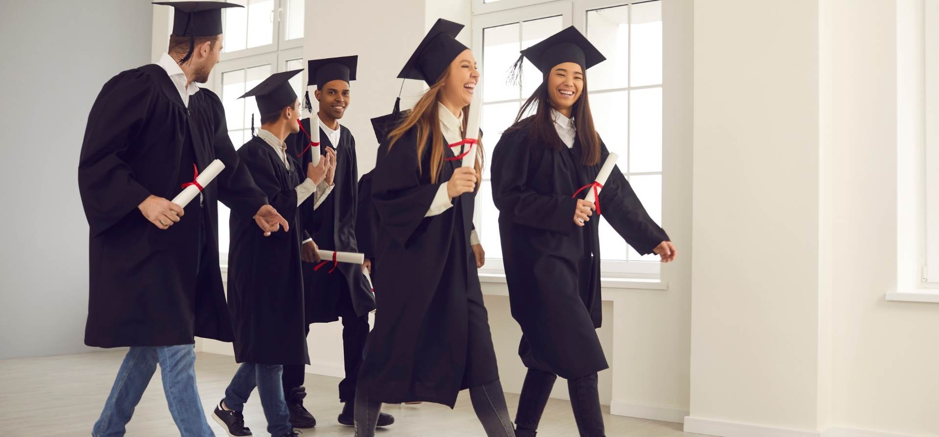 Graduates laughing